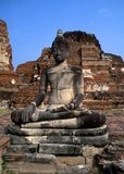 Wat Phra Mahathat was built during the reign of Borommaracha I (Boromma Rachathirat I) or Khun Luang Pa Ngua (1370- 1388), who was the third king of the Ayutthaya Kingdom.<br/><br/>


Ayutthaya (Ayudhya) was a Siamese kingdom that existed from 1351 to 1767. Ayutthaya was friendly towards foreign traders, including the Chinese, Vietnamese (Annamese), Indians, Japanese and Persians, and later the Portuguese, Spanish, Dutch and French, permitting them to set up villages outside the city walls. In the sixteenth century, it was described by foreign traders as one of the biggest and wealthiest cities in the East. The court of King Narai (1656–1688) had strong links with that of King Louis XIV of France, whose ambassadors compared the city in size and wealth to Paris.